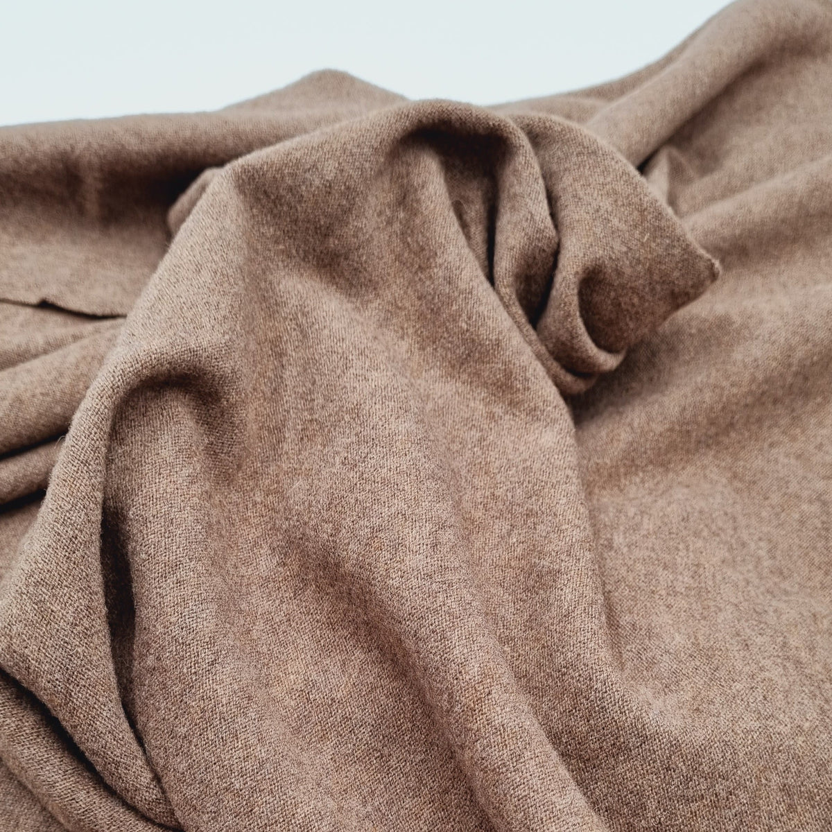 100% Merinostrick beige/braun